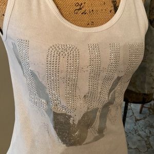Ribbed tank top like new! Features the word Love in embellishment.